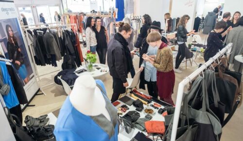 BERLIN, GERMANY - JULY 10: Visitors at Greenshowroom during the Mercedes-Benz Fashion Week Berlin Spring/Summer 2016 at Postbahnhof on July 10, 2015 in Berlin, Germany.  (Photo Thomas Lohnes/Getty Images for Greenshowroom and Ethical Fashion Show Berlin)